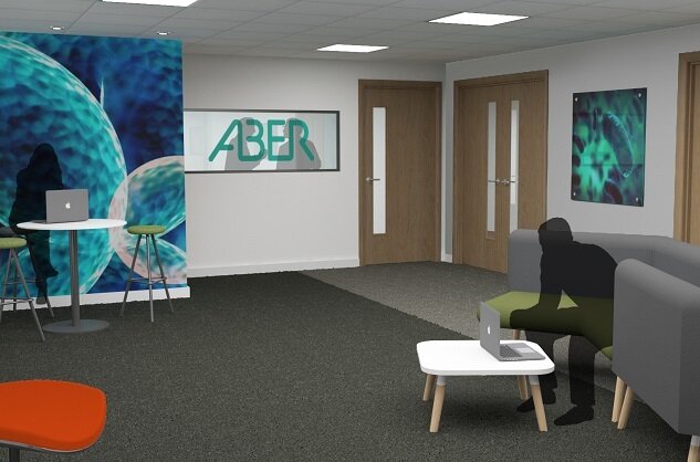 'The new staff break-out space at Aber Instruments, featuring the strong company brand, was designed to promote staff well-being